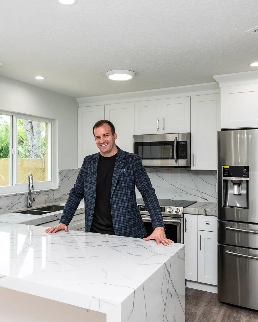James J. Cloud in a completed Cloud Design Build kitchen