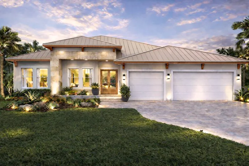 Custom home exterior at twilight in Southwest Florida, built for hurricane-season conditions