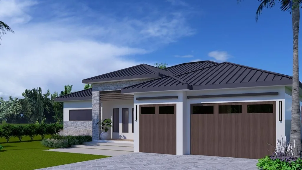 The PALMA Collection from the garage side - two wood garage doors under the standing-seam metal roof, with the stone entry beyond